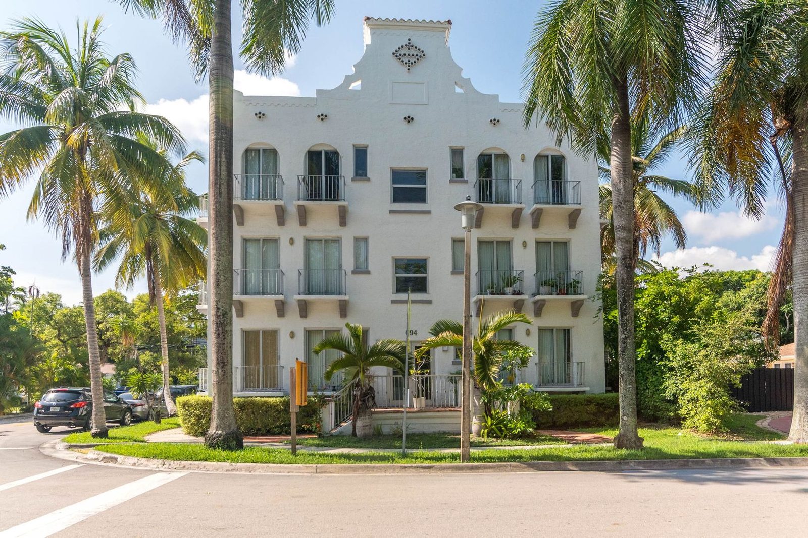 White Art Deco apartment building exterior in Belle Meade