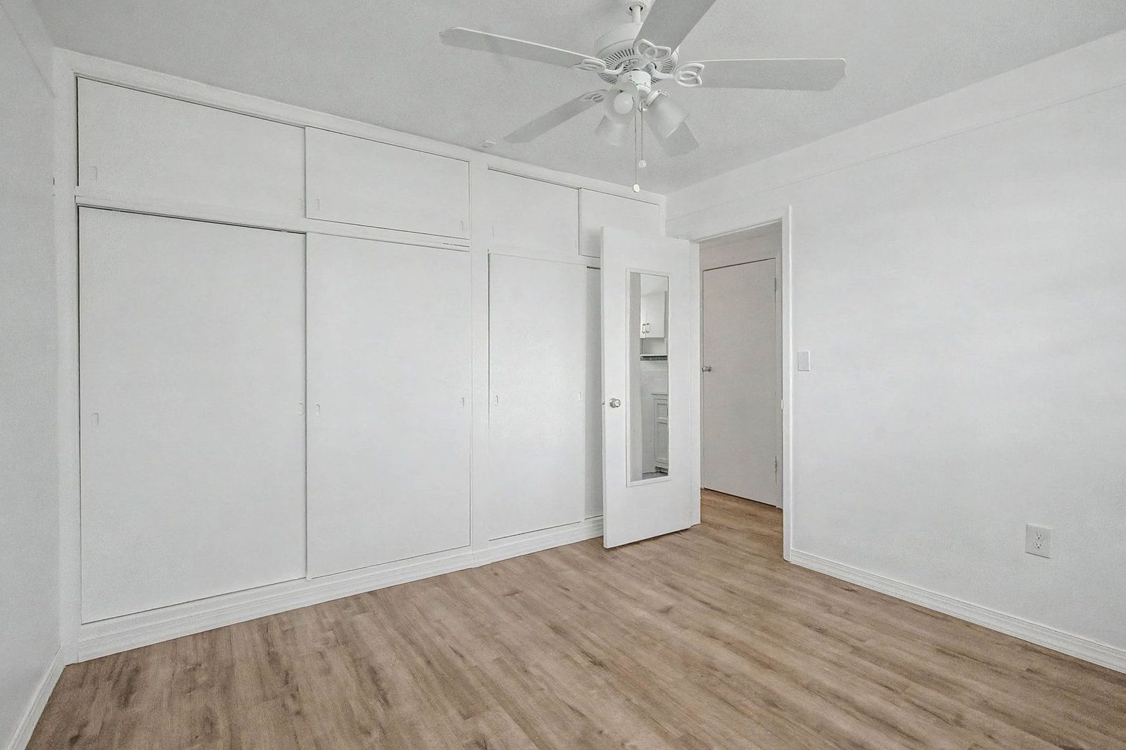 Bedroom with built-in closet space